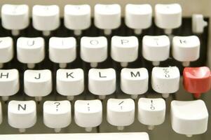 a close up of a typewriter keyboard with the letters oop photo