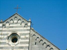 a church with a clock on the side photo