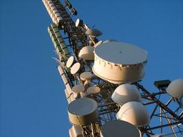 a tower with many different types of antennas photo