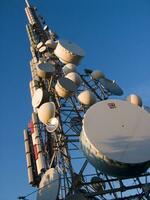 a tower with many different types of antennas photo