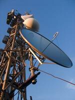 a tower with many different types of antennas photo