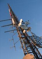 a tower with many different types of antennas photo