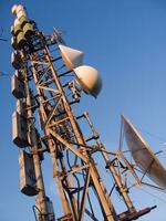 a tower with many different types of antennas photo