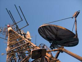 a tower with many different types of antennas photo