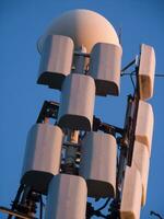 a tower with many different types of antennas photo