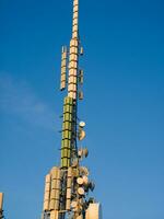 a tower with many different types of antennas photo