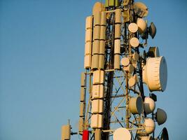 a tower with many different types of antennas photo