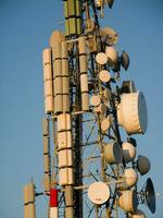 a tower with many different types of antennas photo