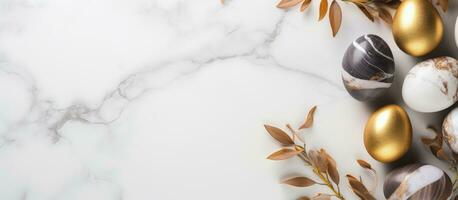 Easter Eggs with Gold and Eucalyptus on a Marble Table, Flat Lay, Top View, Copy Space photo