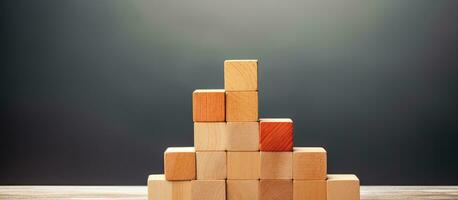 Wooden cube blocks stacked in a plus sign shape represents added value, benefits, and additional photo