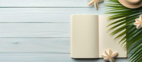 A blank writing book with summer beach accessories in the background, offering plenty of space photo