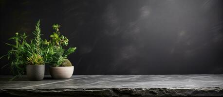 A rustic and dark black cement stone background with an empty grey marble tabletop is ideal photo