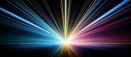 The rainbow light effect from sun flares is seen on a black background, creating colorful glare photo