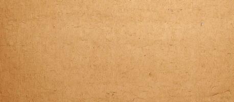 Brown or cream recycled craft paper with a textured background. The pattern is rough and smooth, photo