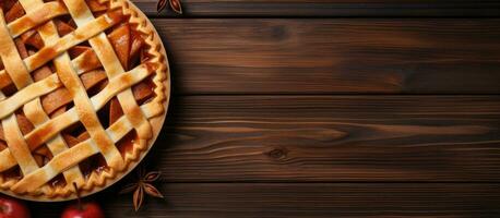 Classic apple pie with space for text on a wooden table, arranged in a flat lay. Perfect for photo