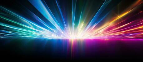 The rainbow light effect from sun flares is seen on a black background, creating colorful glare photo