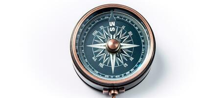 Closeup of a compass on a white background. Used for travel, geography, and navigation. empty photo