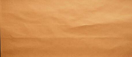 Rough Kraft Paper Background, Paper Texture in Orange Beige Colors. Mockup Includes Copy Space photo