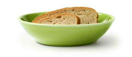 A green bowl with toast placed inside, with empty space on the right side. It is isolated on photo