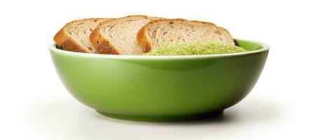 A green bowl with toast placed inside, with empty space on the right side. It is isolated on photo