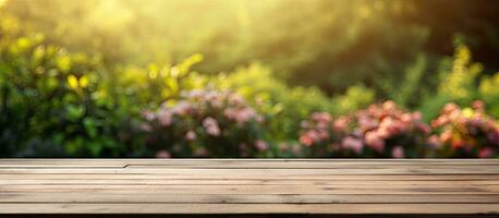 An outdoor garden background with a wooden table top, which is empty and can be used for marketing photo