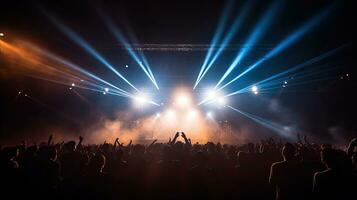 Glimpse of concert audience blocking stage lights photo