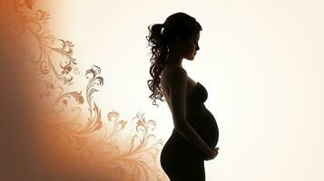 embarazada mujer s contorno en blanco fondo foto