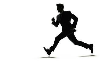 Silhouetted caucasian businessman on white background running photo