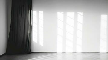 Defocused light from the window casts blurry shadows on the white wall mimicking empty space for a mockup photo