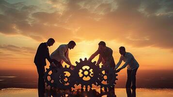 Businessmen join gears in a sunset themed puzzle symbolizing partnership cooperation teamwork and creativity photo