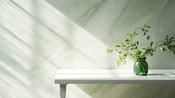 Green branch of tree with shadow against white marble tile wall and wood table with copy space in the spring sunlight photo