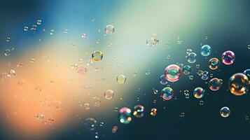 Clear carbonated drink bubbles float above a hazy backdrop photo