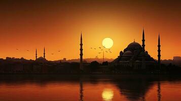 Mosque outline with minarets at sunset in Istanbul photo