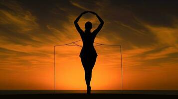 Gymnast s shadow portrayed at dusk photo