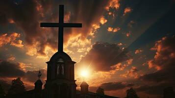 Silhouette of cross and belfry against cloudy sky at Catholic church in Shrine of our Lady Trsat photo