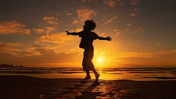 un niño realiza un pequeño danza durante puesta del sol foto