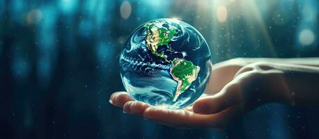 World water day with a globe in the shape of a water drop falling onto a boy s hand against a blue sea background Furnished by NASA photo