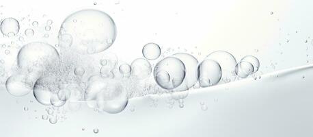 Foamy texture of a skincare cleanser with soap bubbles on a white background and empty space photo