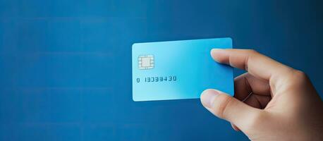 Credit card mockup with chip on blue background ensuring secure transactions at store terminals High quality photograph photo