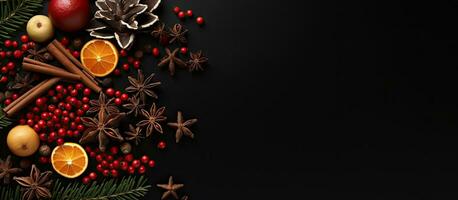 Top down black background with Christmas decorations for flat lay with room for text photo
