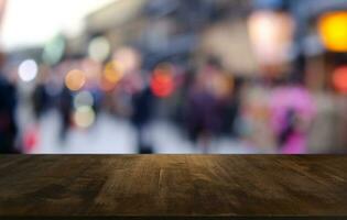 Empty wooden table in front of abstract blurred background of coffee shop . can be used for display or montage your products.Mock up for display of product photo