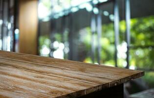 Empty wooden table in front of abstract blurred background of coffee shop . can be used for display or montage your products.Mock up for display of product photo