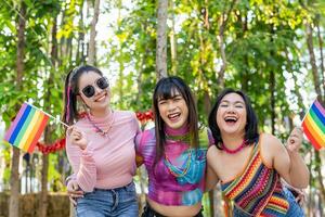 Group of friends LGBTQ having fun together happy Thai transgender Asian woman LGBTQIA at music festival LGBT photo