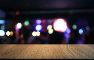 Wood Table Top in Blur Background room interior with empty copy space. photo