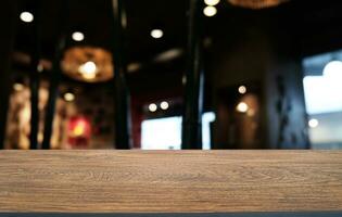 Wood Table Top in Blur Background room interior with empty copy space. photo