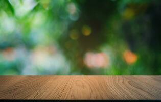 Empty dark wooden table in front of abstract blurred bokeh background of restaurant . can be used for display or montage your products.Mock up for space. photo