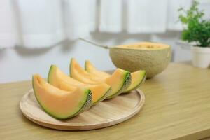 Fruits for healthcare Green Melon wooden table honey melon or cantaloupe photo