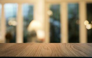 Empty wooden table in front of abstract blurred background of coffee shop . can be used for display or montage your products.Mock up for display of product photo