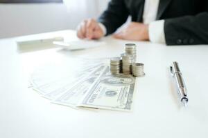 Accountant Working man uses calculator with Spreadsheet document, information financial concept. photo