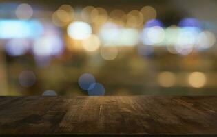 Empty wood table top and blur of out door garden background Empty wooden table space for text marketing promotion. blank wood table copy space for background photo